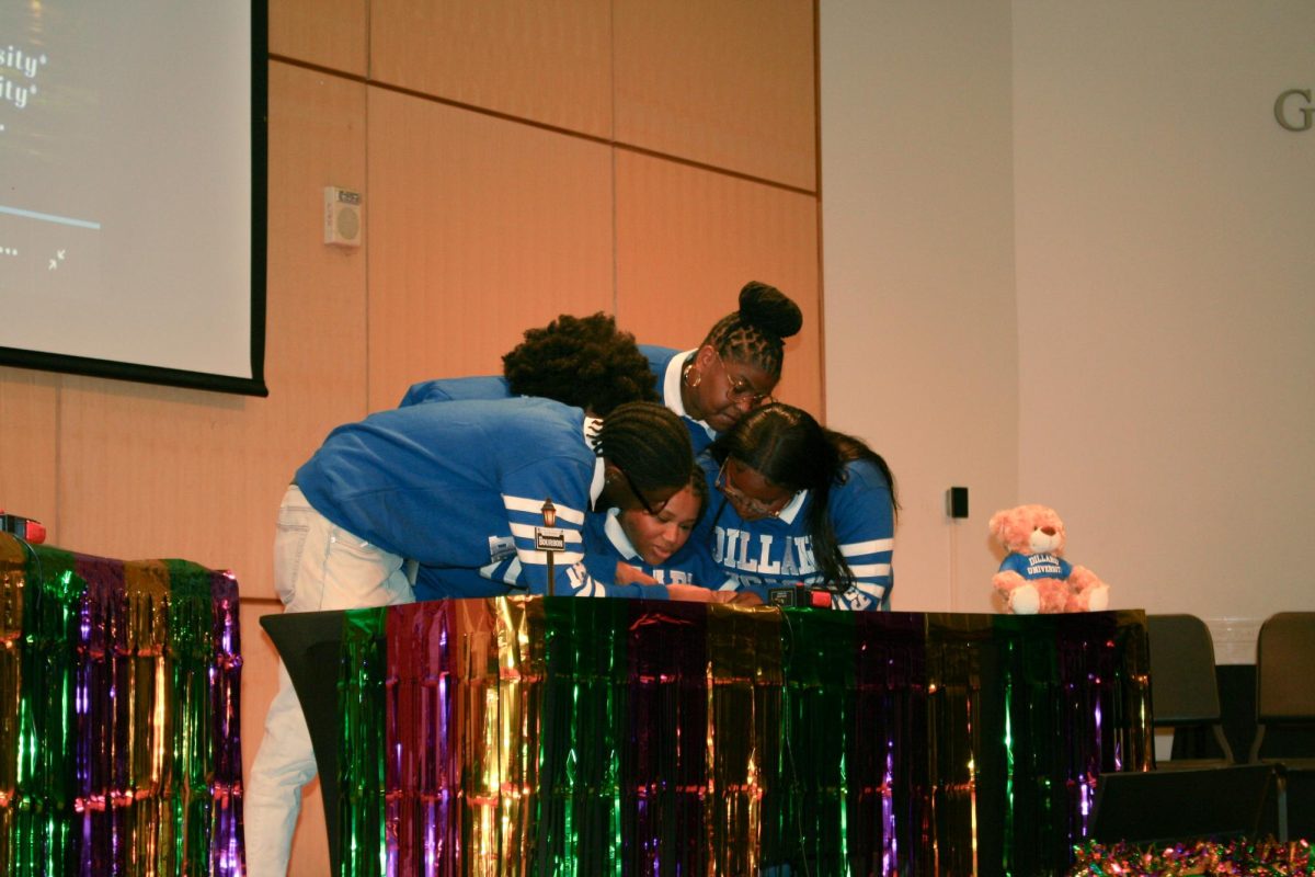 Dillard University's Honda Campus All-Star Challnege Team on stage in Georges Auditorium, competing in the National Quailifying Tournament.