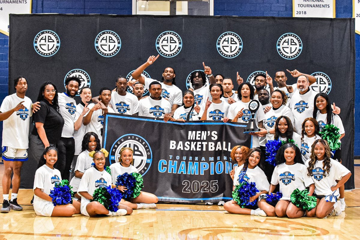 Linda Bell, Ph.D., and students celebrate the Dillard University Men's Basketball Team winning the HBCU Athletic Conference Tournament in 2025.